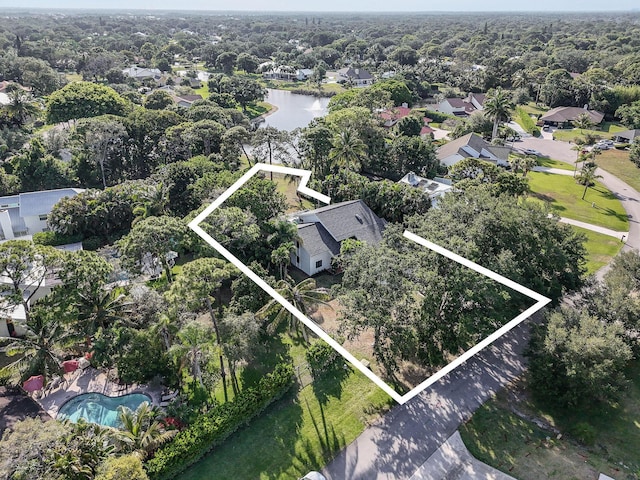 19523 Trails End Ter, Jupiter, FL 33458 - aerial overview of property's location with property parcel outlined, a large body of water, and nearby suburban area
