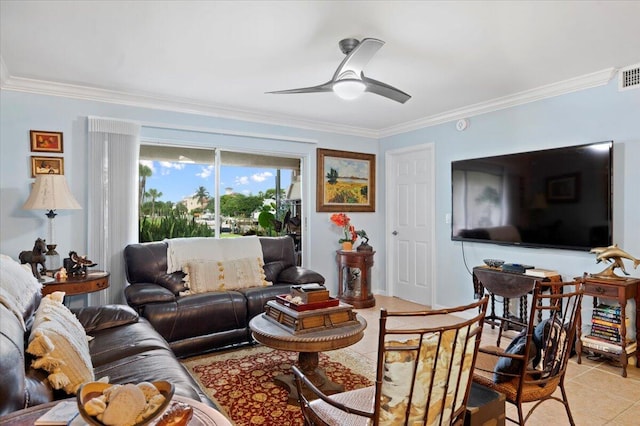 tiled living room featuring crown molding and ceiling fan