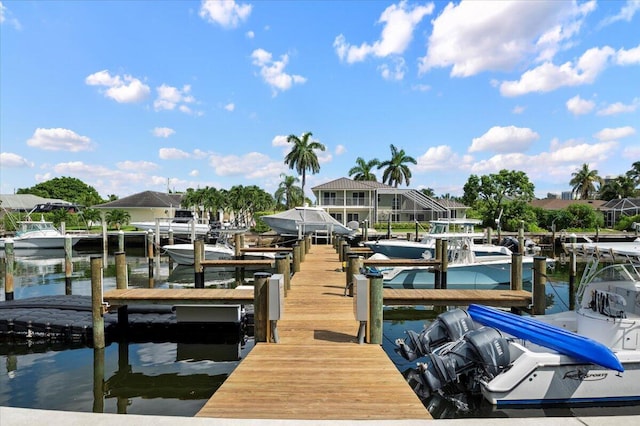 dock area featuring a lanai and a water view