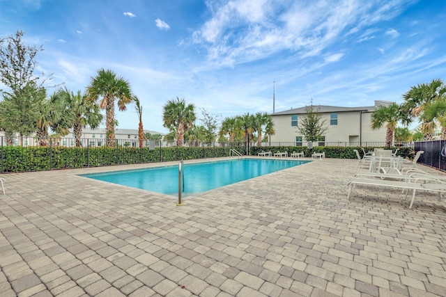 view of pool featuring a patio