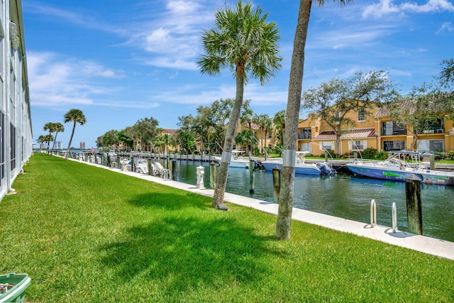 exterior space with a boat dock and a water view