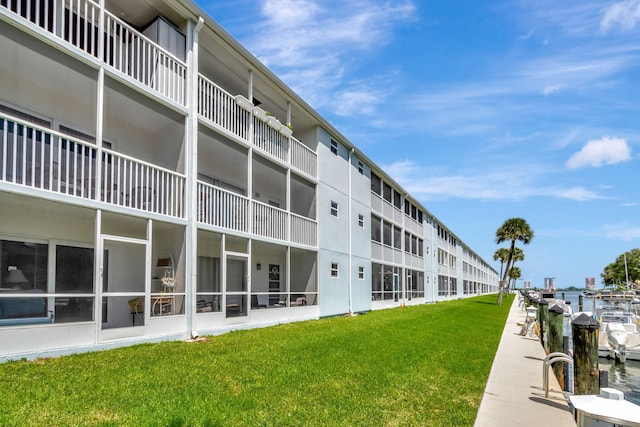 view of building exterior with a water view