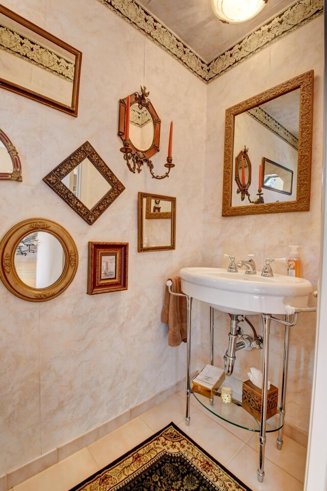 bathroom with tile patterned flooring