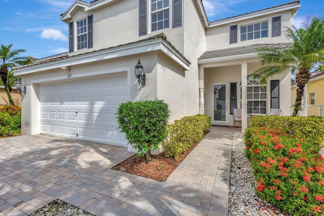 view of front of property with a garage