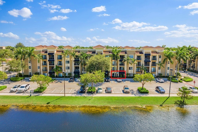 view of building exterior featuring a water view