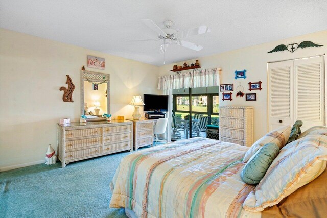 living room featuring ceiling fan, a textured ceiling, vaulted ceiling, and carpet