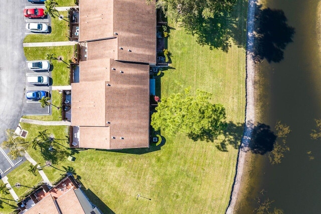 bird's eye view with a water view