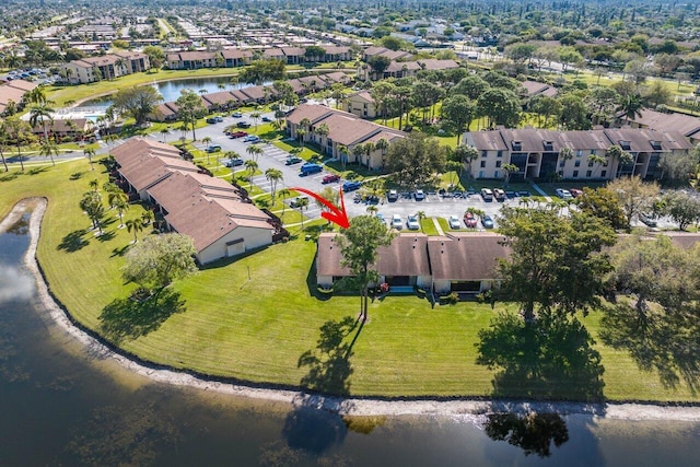 aerial view featuring a water view and a residential view