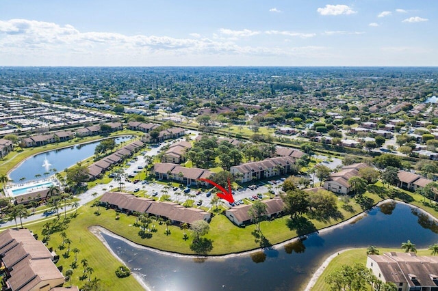 aerial view with a water view and a residential view