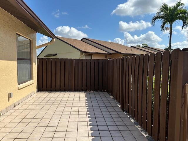 view of patio with fence