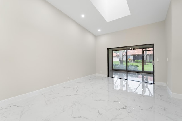 empty room featuring a skylight