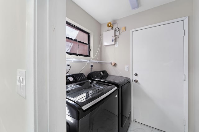 laundry area with separate washer and dryer