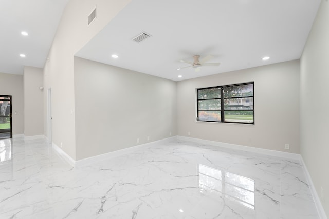 spare room with ceiling fan