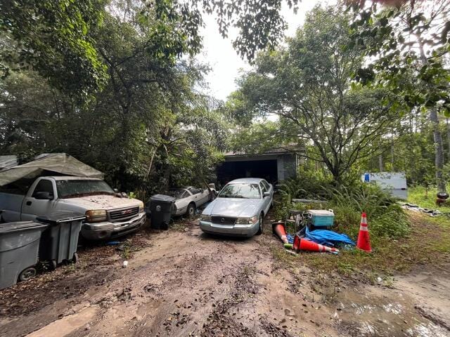 view of yard featuring a garage