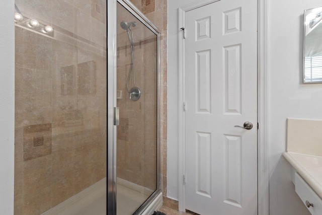 bathroom featuring vanity and walk in shower