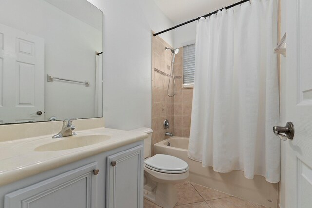 bathroom featuring tile patterned floors, vanity, and independent shower and bath