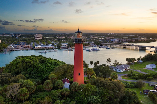 aerial view at dusk with a water view