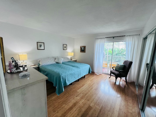 bedroom featuring wood-type flooring