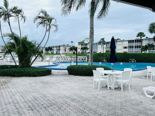 view of pool with a patio area