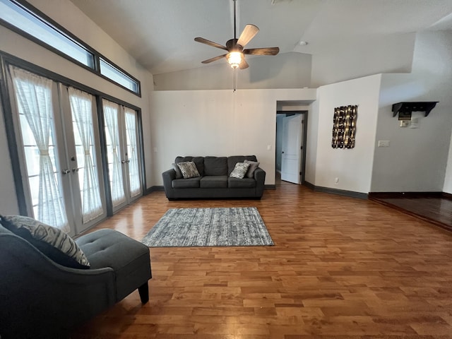 living room with wood-type flooring, french doors, high vaulted ceiling, and ceiling fan