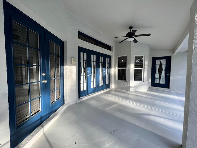 exterior space featuring french doors and ceiling fan