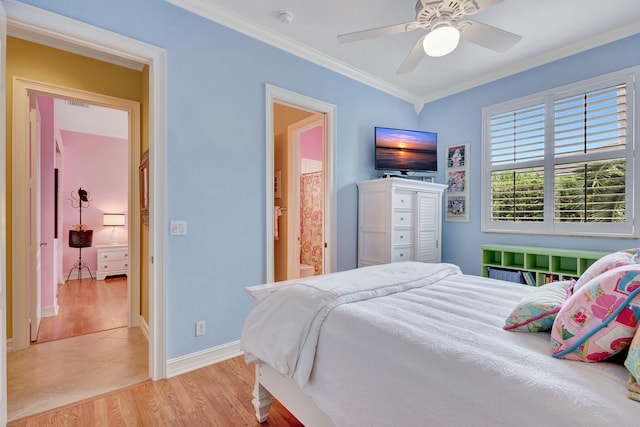 bedroom featuring light wood-type flooring, crown molding, and ceiling fan