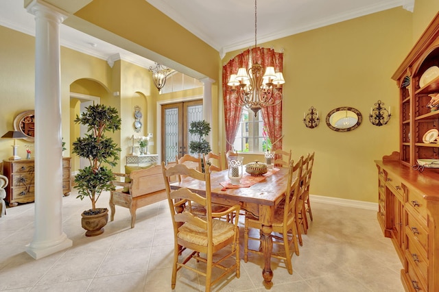 tiled dining space with french doors, an inviting chandelier, crown molding, and decorative columns