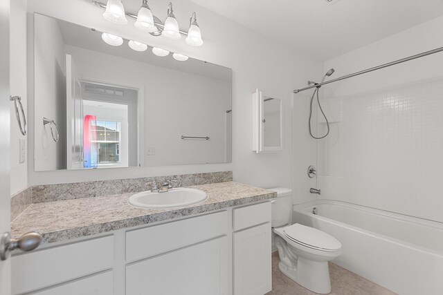 full bathroom featuring shower / bathtub combination, vanity, and toilet