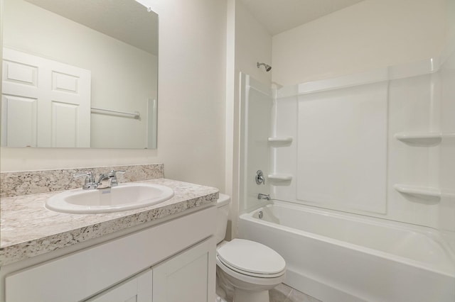 bathroom with toilet, vanity, and washtub / shower combination