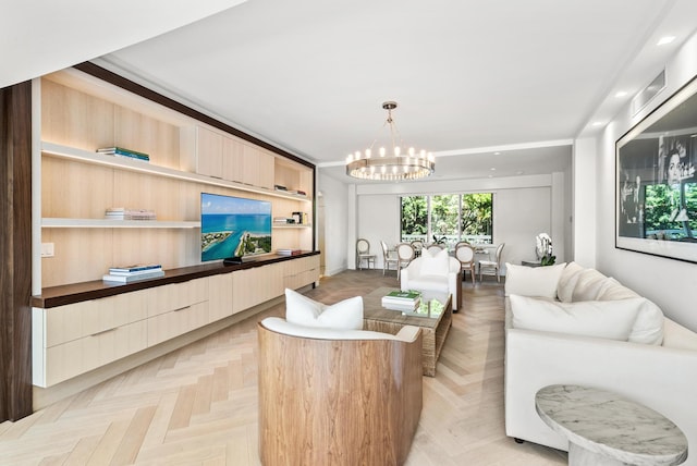 living room featuring a chandelier and light parquet floors