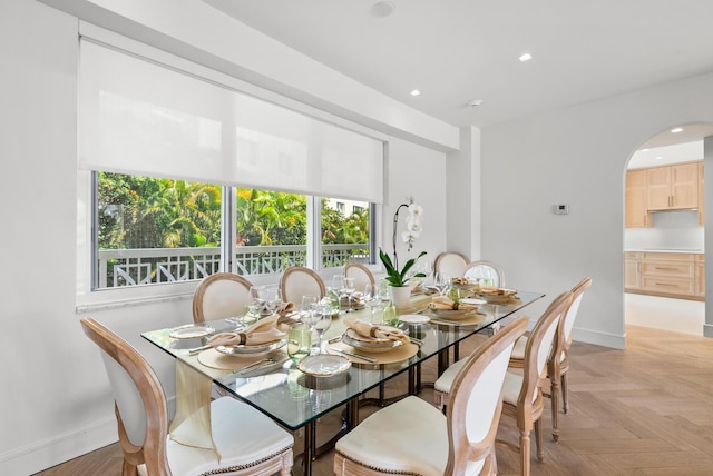 dining area with light parquet flooring