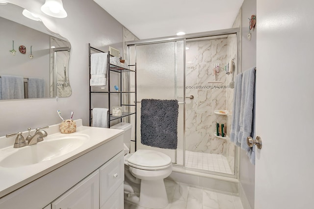 full bathroom with a marble finish shower, toilet, marble finish floor, and vanity