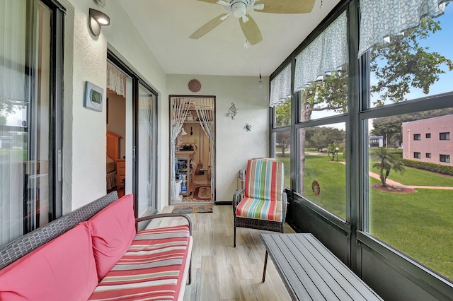 sunroom / solarium with ceiling fan