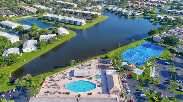 aerial view with a water view and a residential view