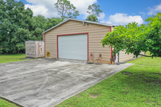 garage with a yard