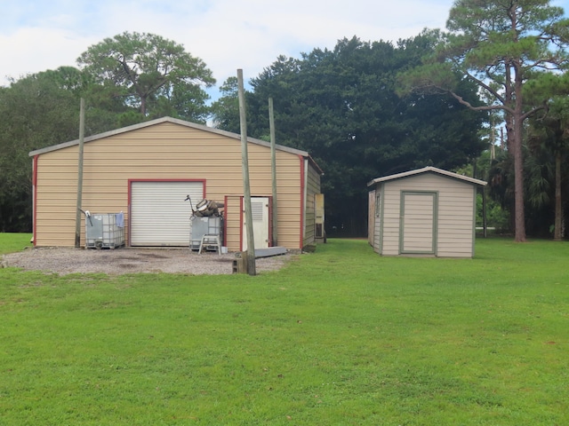 garage with a yard