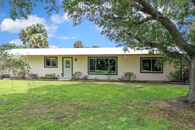 ranch-style house with a front yard