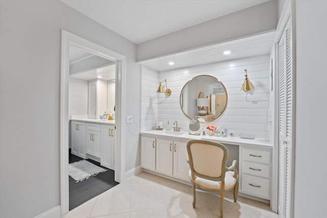 bathroom featuring tile patterned floors and vanity