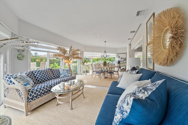 living room featuring an inviting chandelier