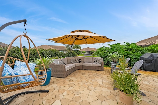 view of patio / terrace featuring an outdoor living space and area for grilling