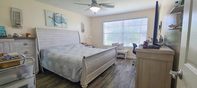 bedroom with ceiling fan and dark wood-type flooring