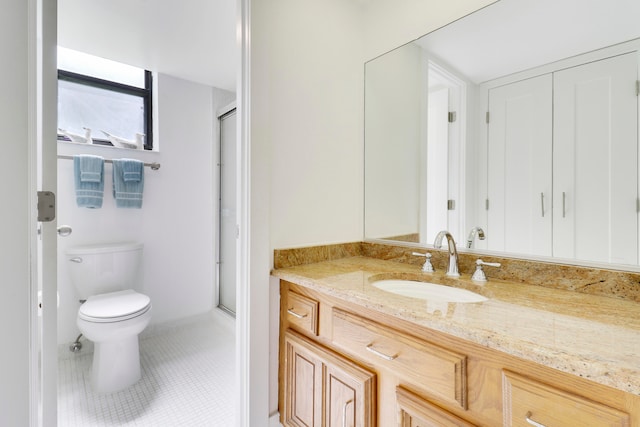 bathroom featuring tile patterned floors, walk in shower, vanity, and toilet