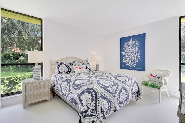 bedroom featuring multiple windows