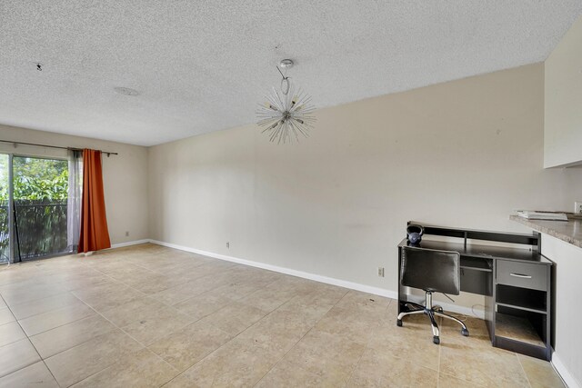 office space featuring a textured ceiling