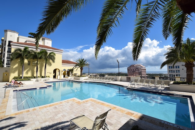 view of pool featuring a patio area