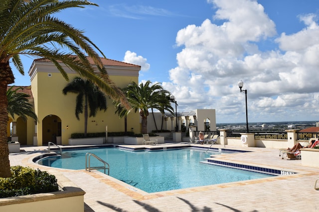 view of pool featuring a patio area