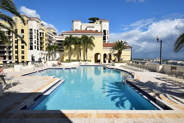 view of swimming pool with a patio