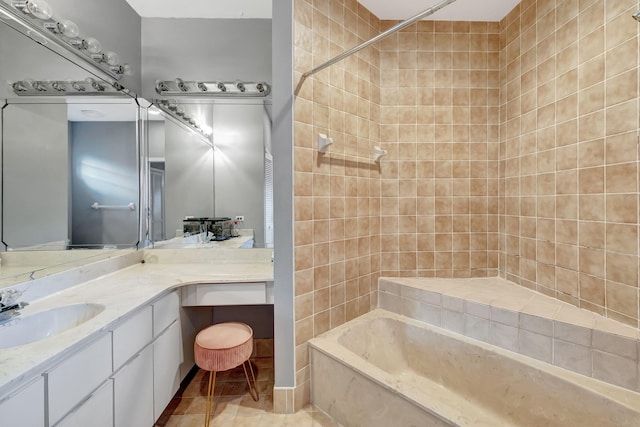 bathroom featuring vanity and tiled shower / bath combo