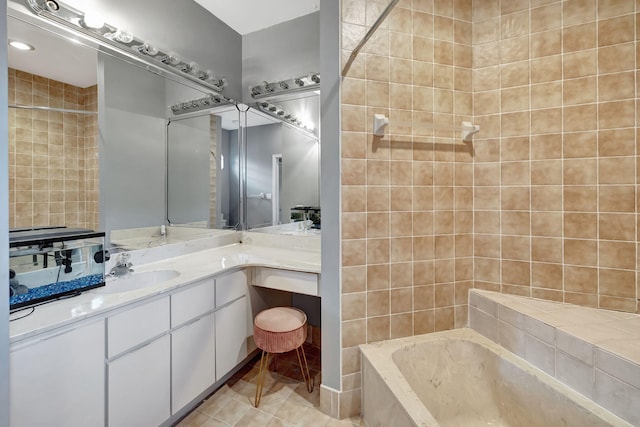 bathroom featuring vanity, plus walk in shower, and tile patterned floors