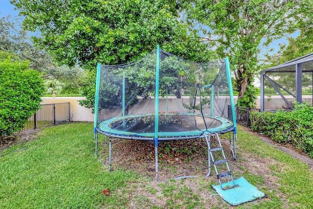 view of yard featuring a trampoline